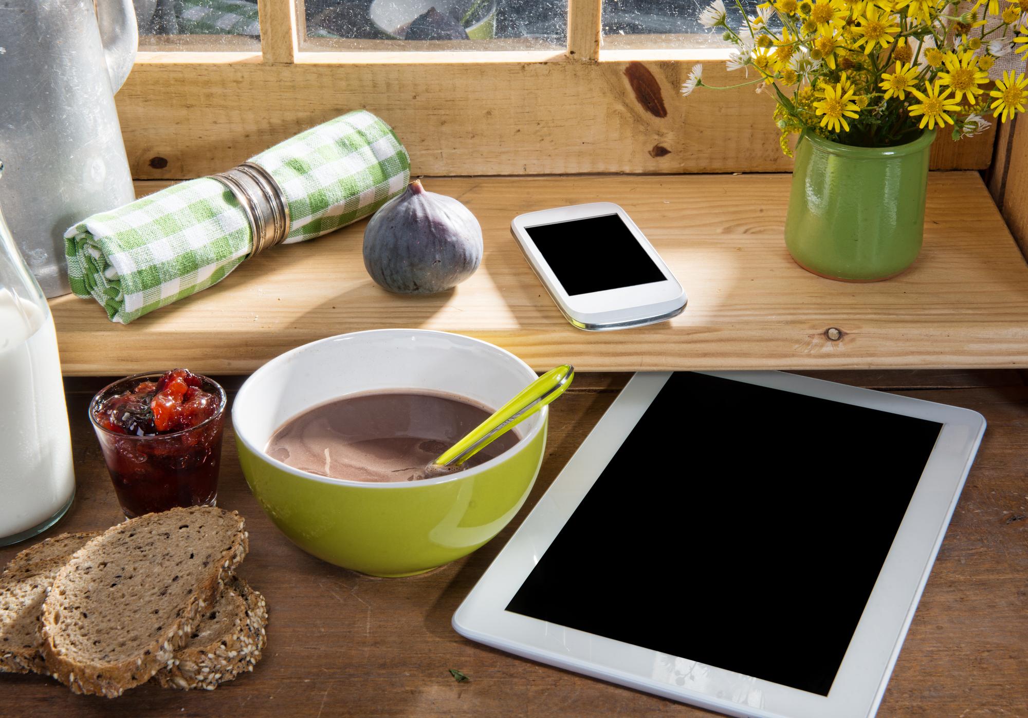 Compact workstation with tablet showing recipe